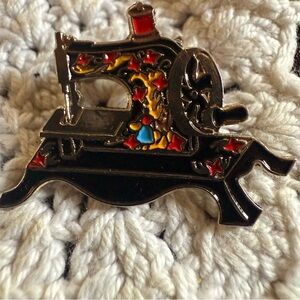 Enamel Sewing Machine Pin with Red & Yellow Accents